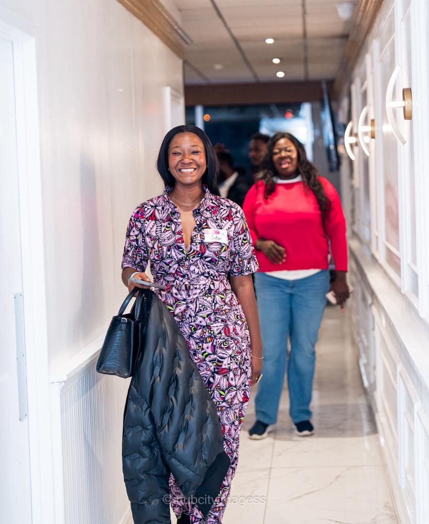 Guest arriving in printed African attire at a linkup